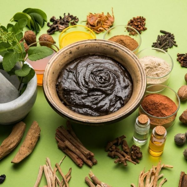 Indian Ayurvedic dietary supplement called Chyawanprash / chyavanaprasha is a cooked mixture of sugar, honey, ghee, Indian Gooseberry (amla), jam, sesame oil, berries, herbs and various spices Indian Ayurvedic dietary supplement called Chyawanprash / chyavanaprasha is a cooked mixture of sugar, honey, ghee, Indian Gooseberry (amla), jam, sesame oil, berries, herbs and various spices